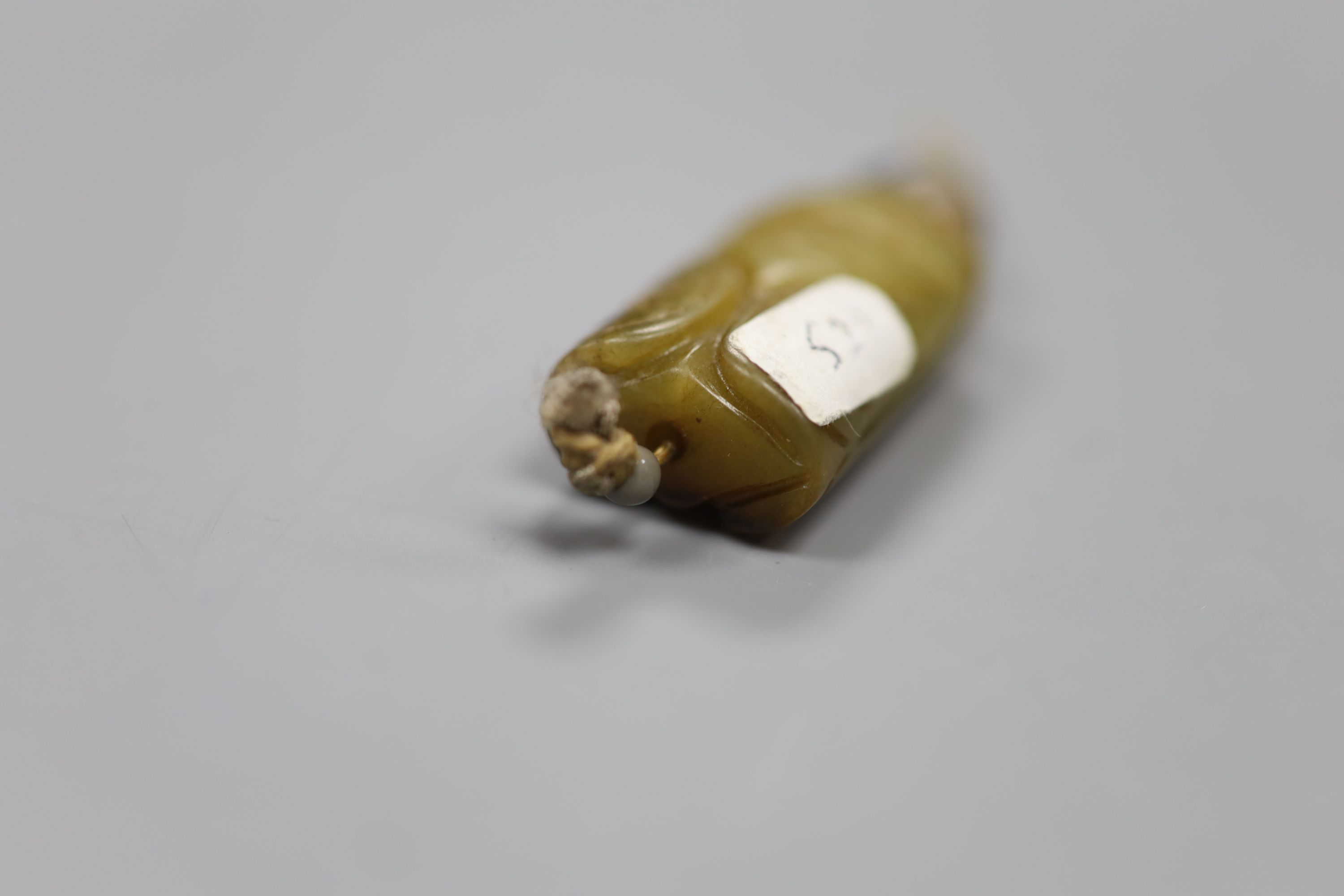 A Chinese jade cicada pendant, length 4cm